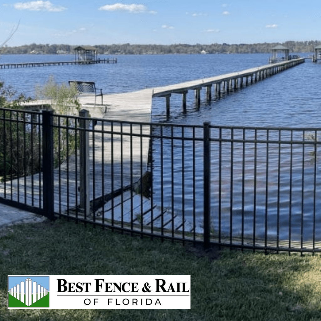 Aluminum fence along a dock on the river.