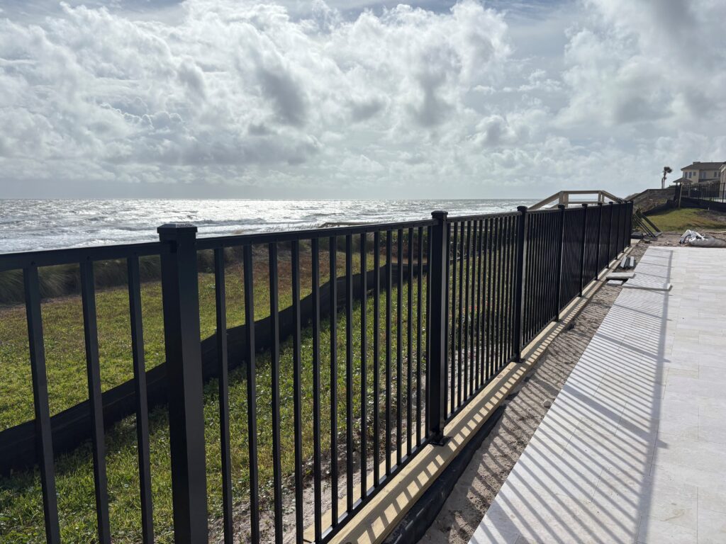 Aluminum fence by the coast shows as top fence trends in 2026