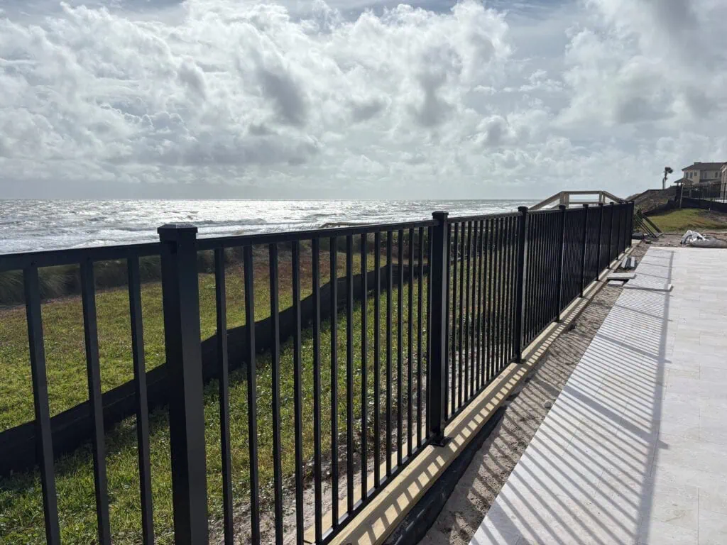 Aluminum fence by the coast shows as top fence trends in 2026