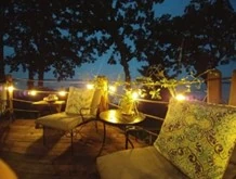 Patio at night with hanging lights