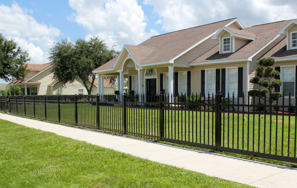 House with Black Metal Fence