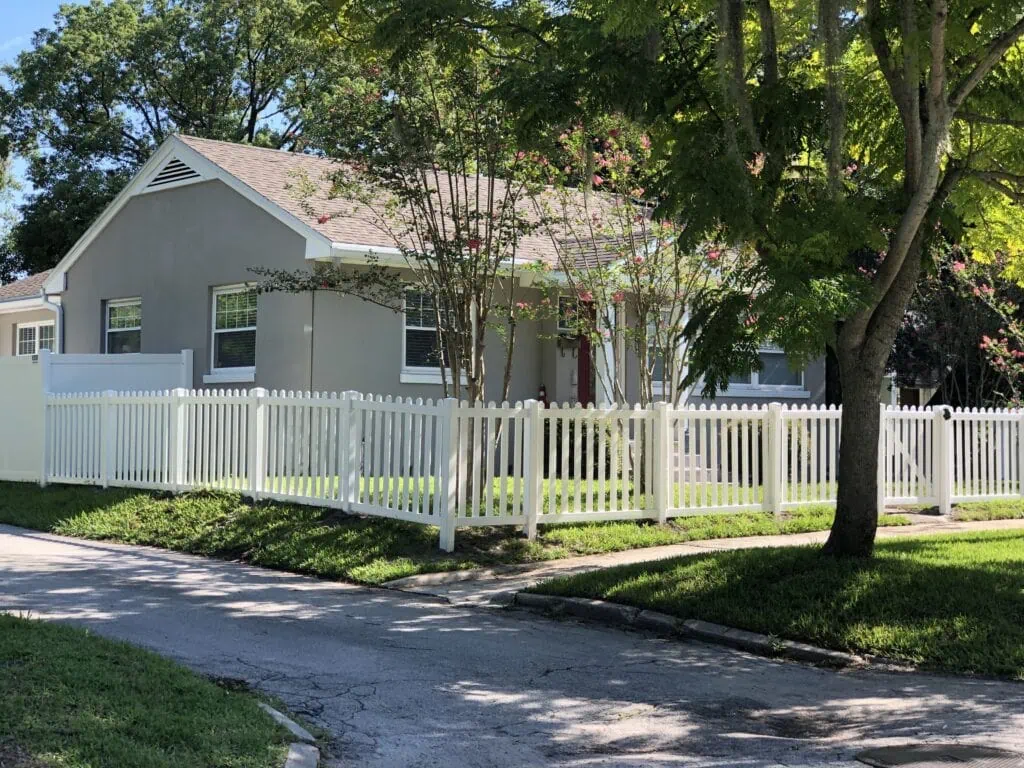 Suburban house with while picket fence